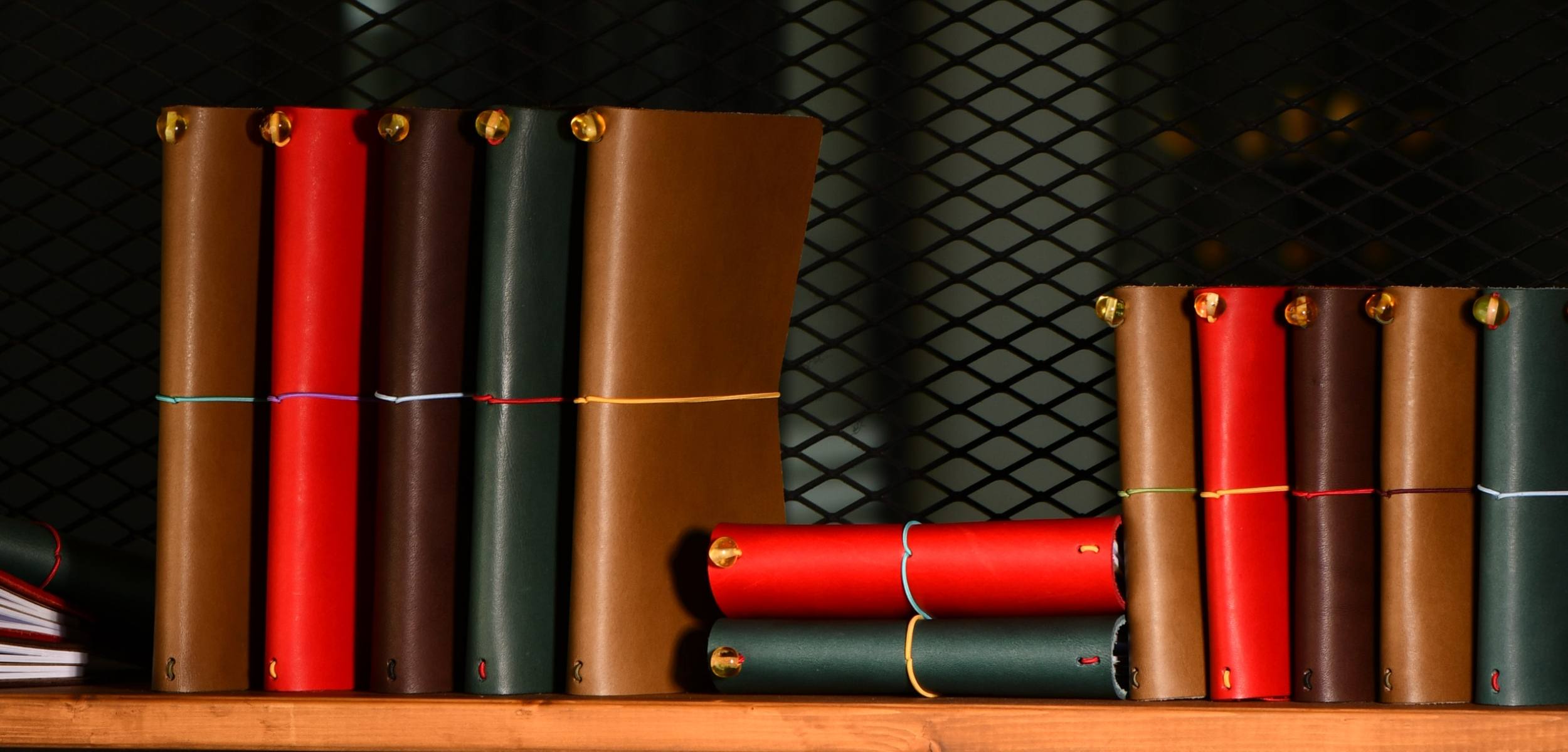 Bielinis-leather-journal-on-shelf-in-various-colours.jpg