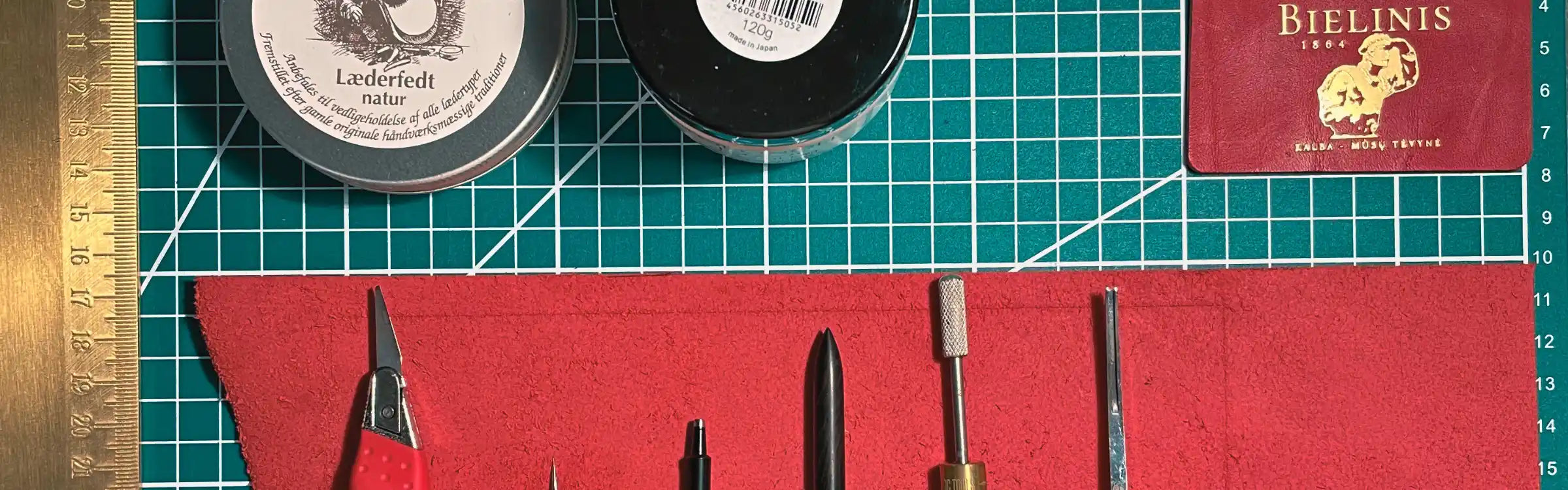leathercraft-tools-and-care-cream-on-cutting-mat-footer2.webp