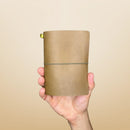 Bielinis best handmade traveler’s journal Vellum in rugged army green leather, front view showcasing genuine Baltic amber details and compact pocket size for on-the-go inspiration.