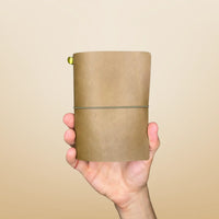 Bielinis best handmade traveler’s journal Vellum in rugged army green leather, front view showcasing genuine Baltic amber details and compact pocket size for on-the-go inspiration.