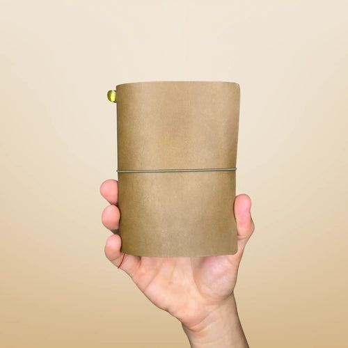 Bielinis best handmade traveler’s journal Vellum in rugged army green leather, front view showcasing genuine Baltic amber details and compact pocket size for on-the-go inspiration.