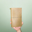 Bielinis handmade traveler’s leather journal Atlas in army green, front view highlighting genuine Baltic amber, premium craftsmanship and durable design.