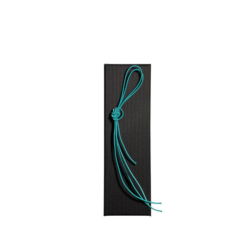 Elastic cord closure for handmade leather traveler’s journal in turquoise, available in various colors.